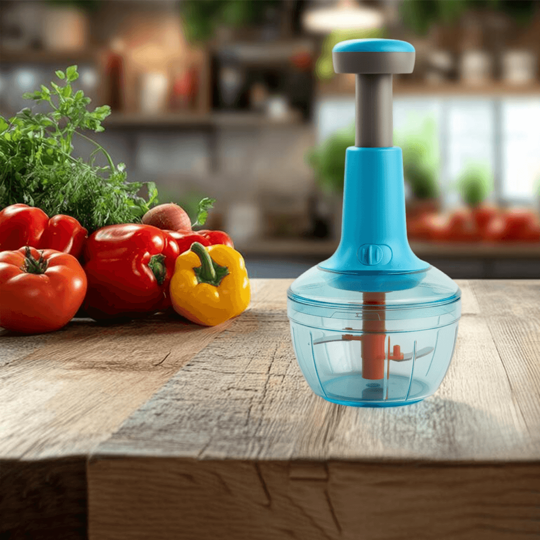 Manual vegetable chopper with transparent container